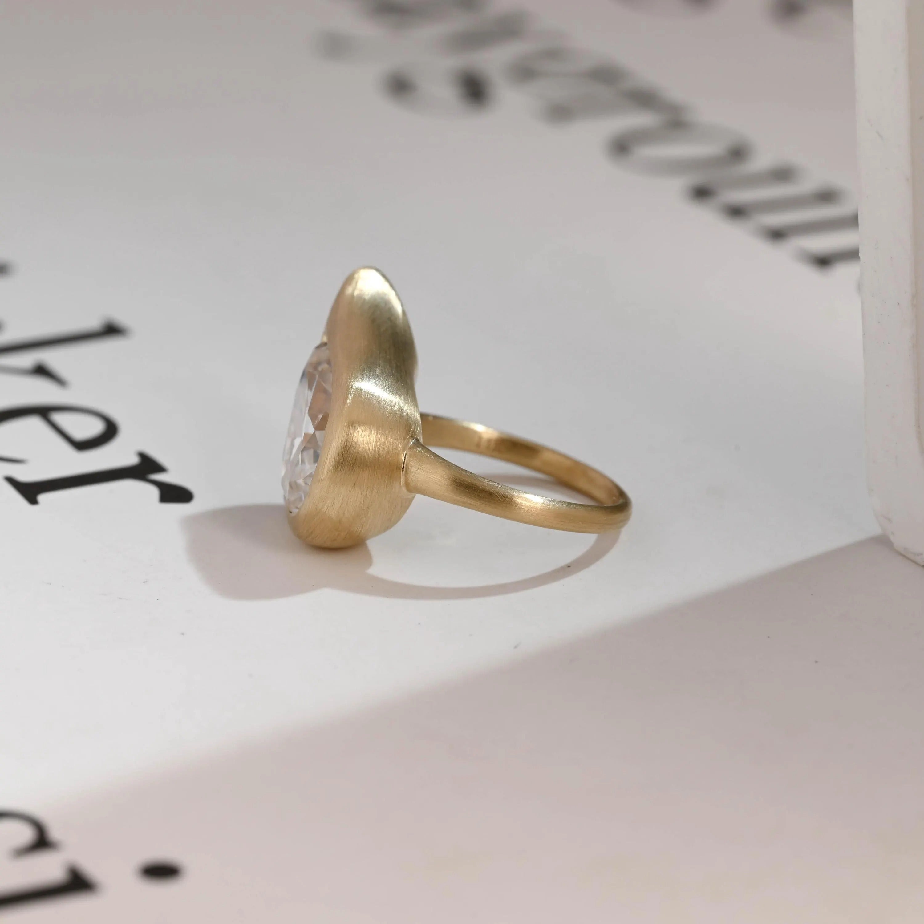 Solid Gold Pear Moissanite Engagement Ring, Bezel Set Brushed Finish