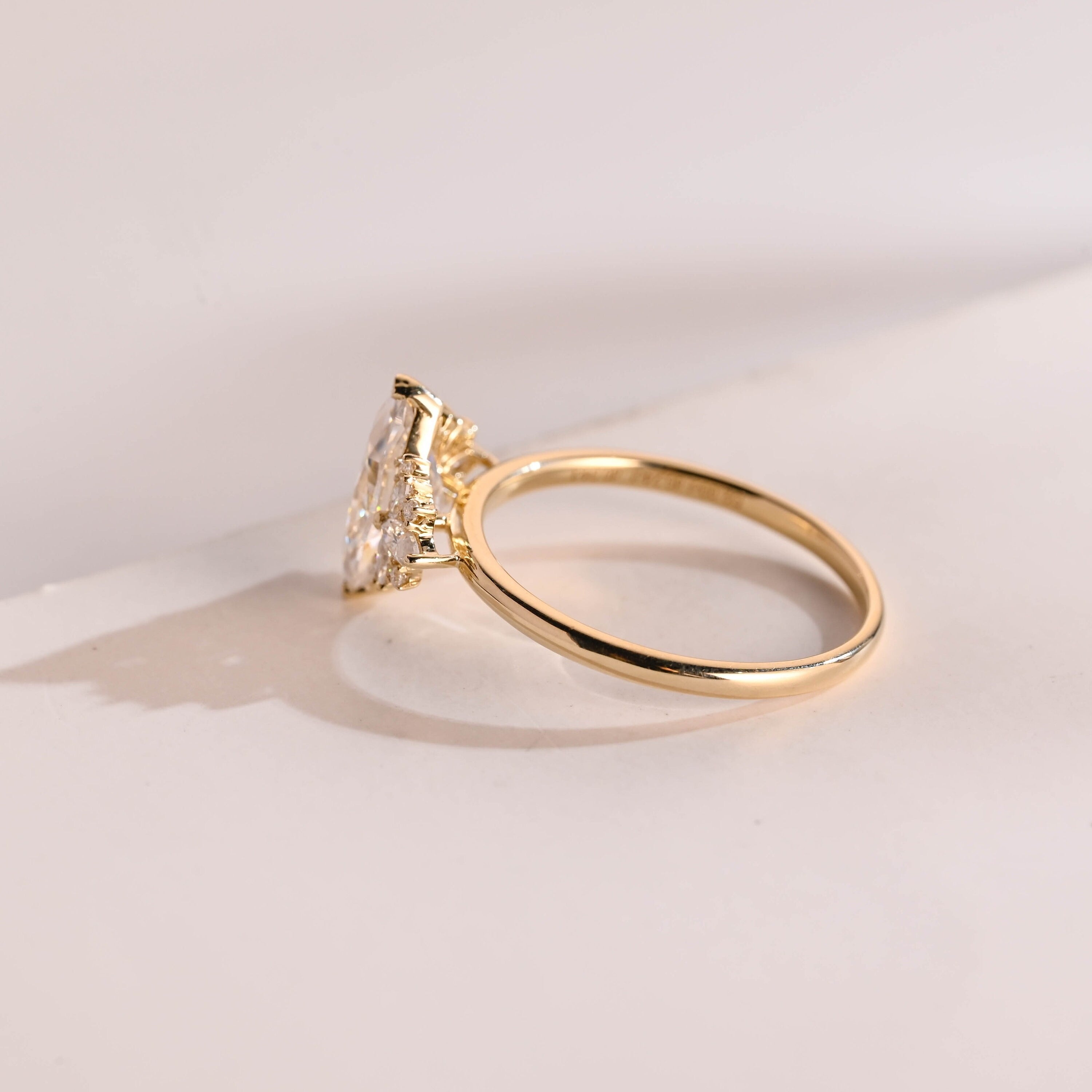 Solid Gold Marquise Moissanite Engagement Ring with Accent Stones