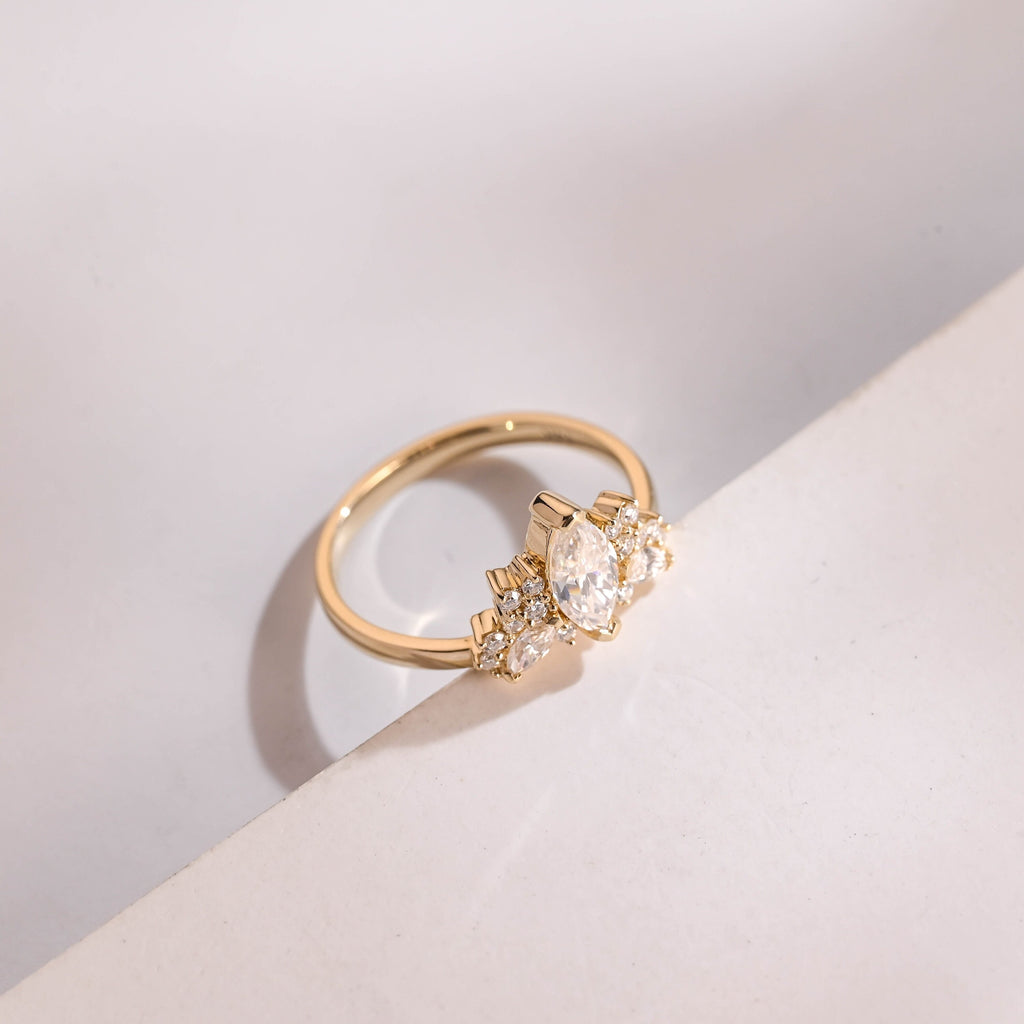 Solid Gold Marquise Moissanite Engagement Ring with Accent Stones