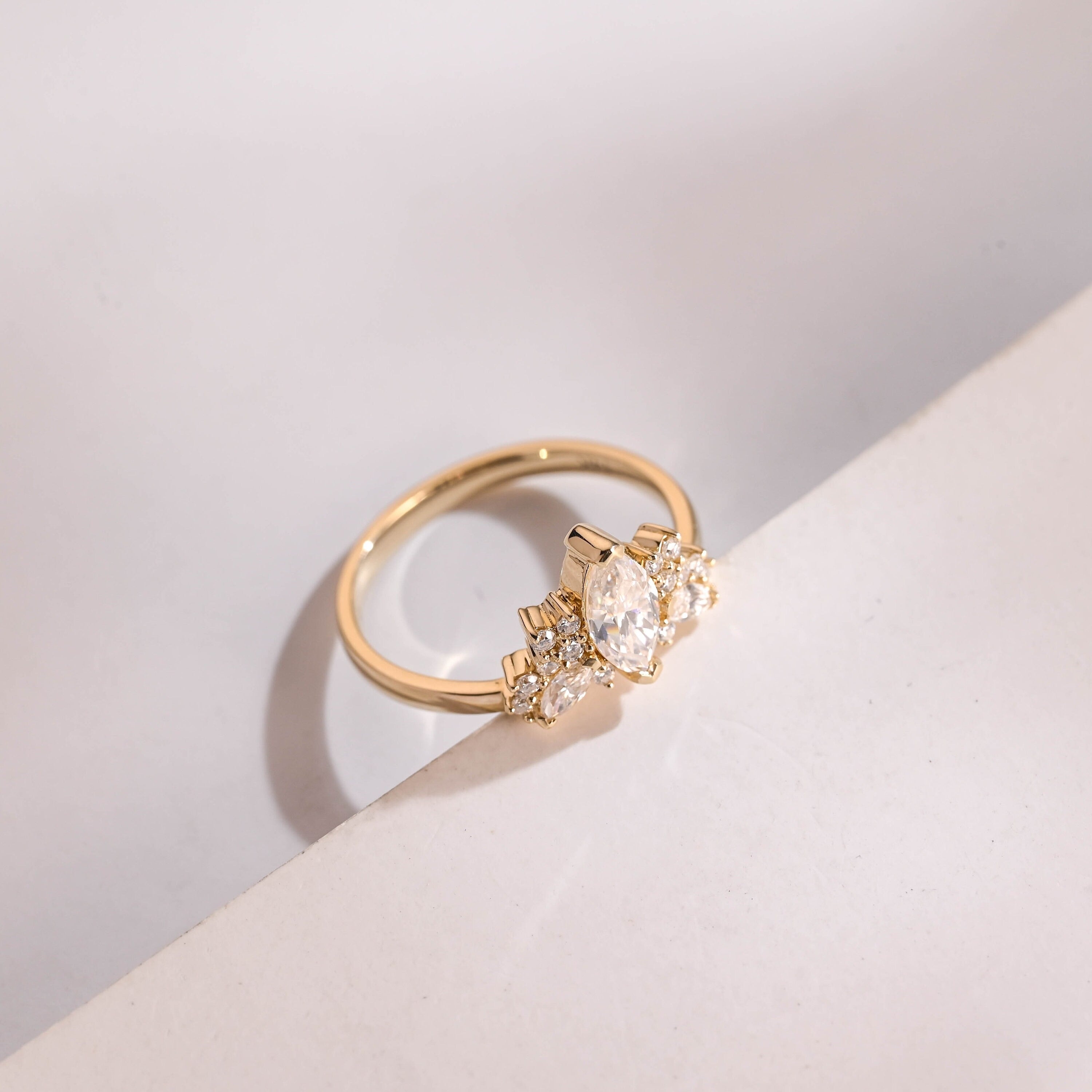 Solid Gold Marquise Moissanite Engagement Ring with Accent Stones