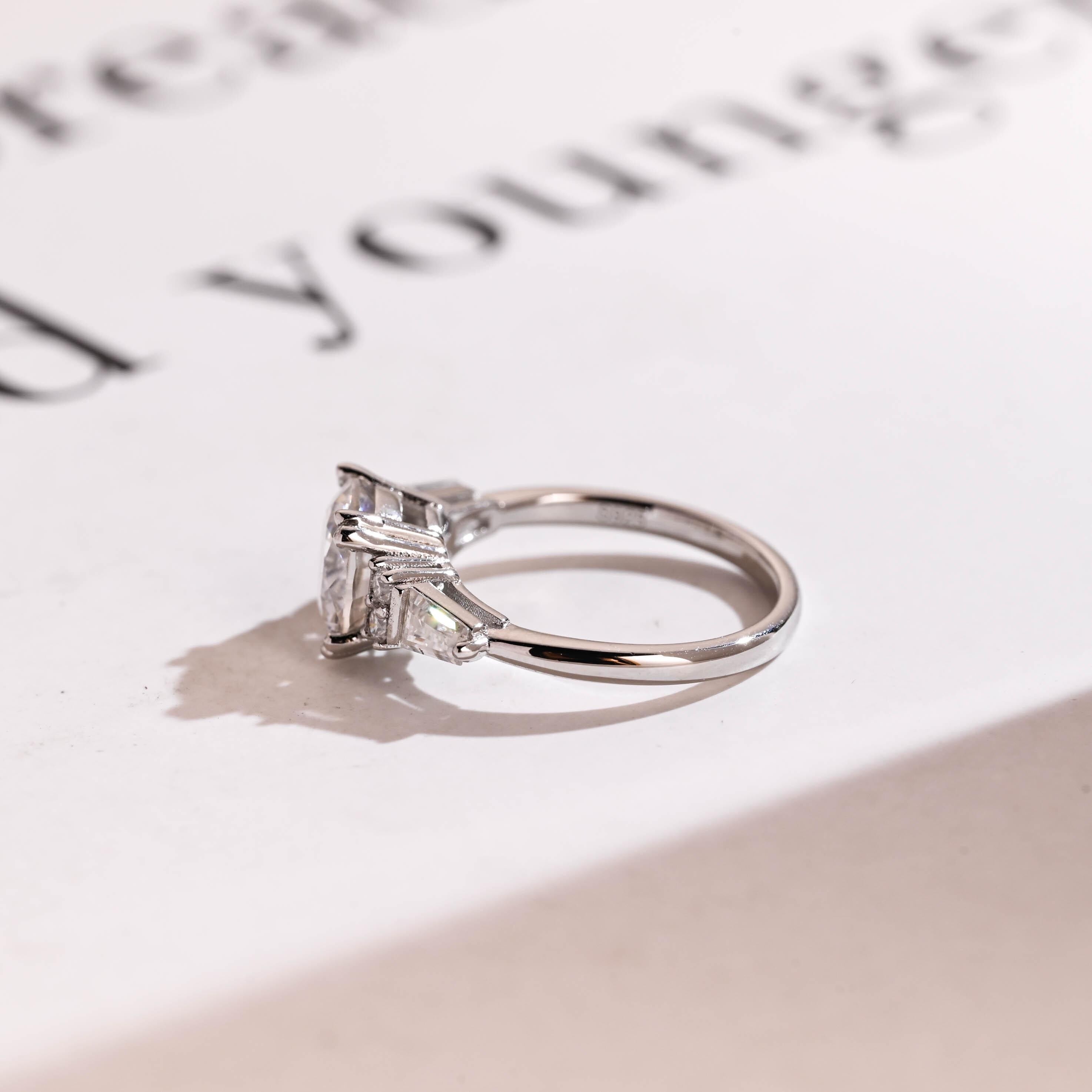 Solid Gold Round Cut Moissanite Engagement Ring with Trapezoid Accent