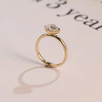 Solid Gold East-West Pear Moissanite Engagement Ring