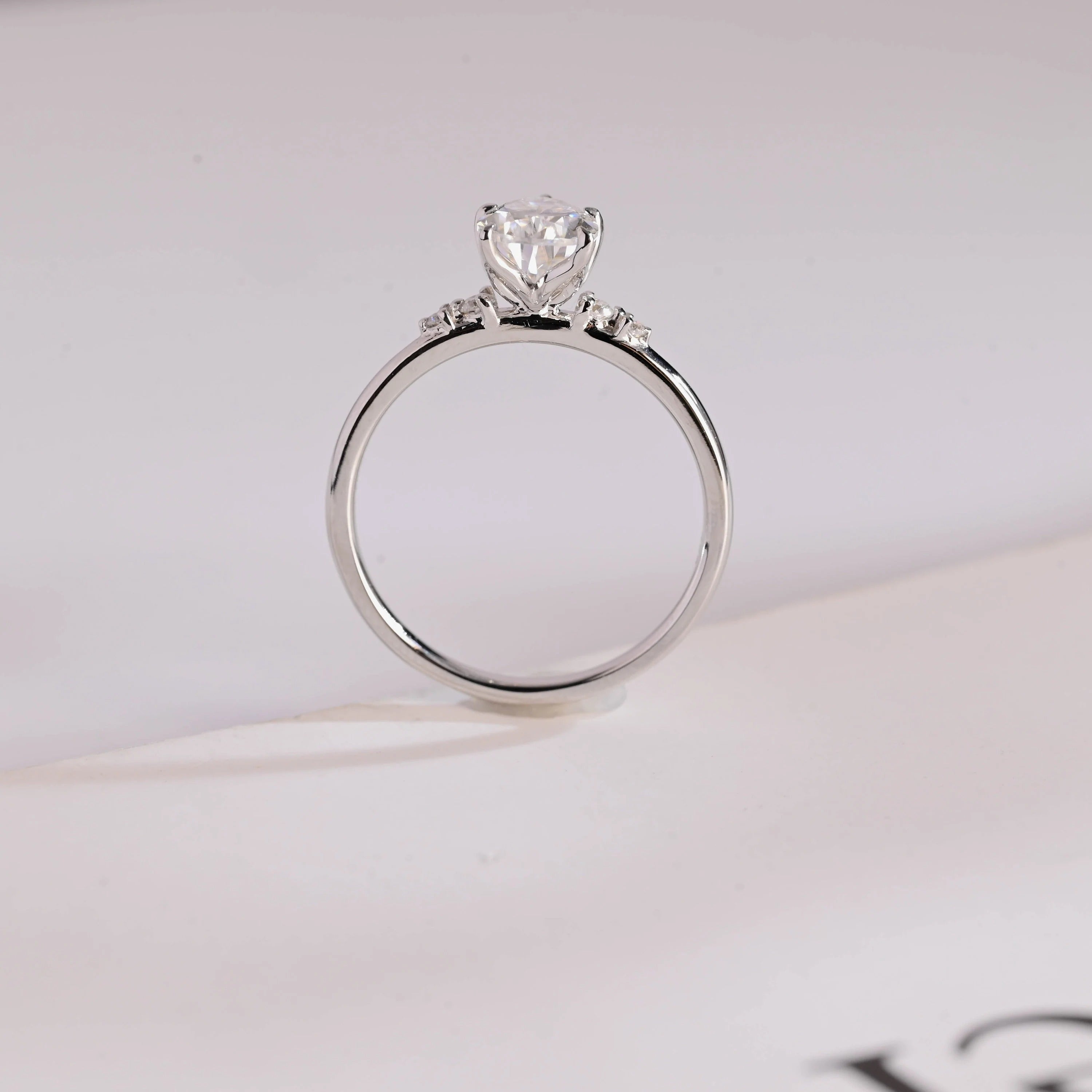 Solid Gold Pear Cut Moissanite Engagement Ring with Side Stone