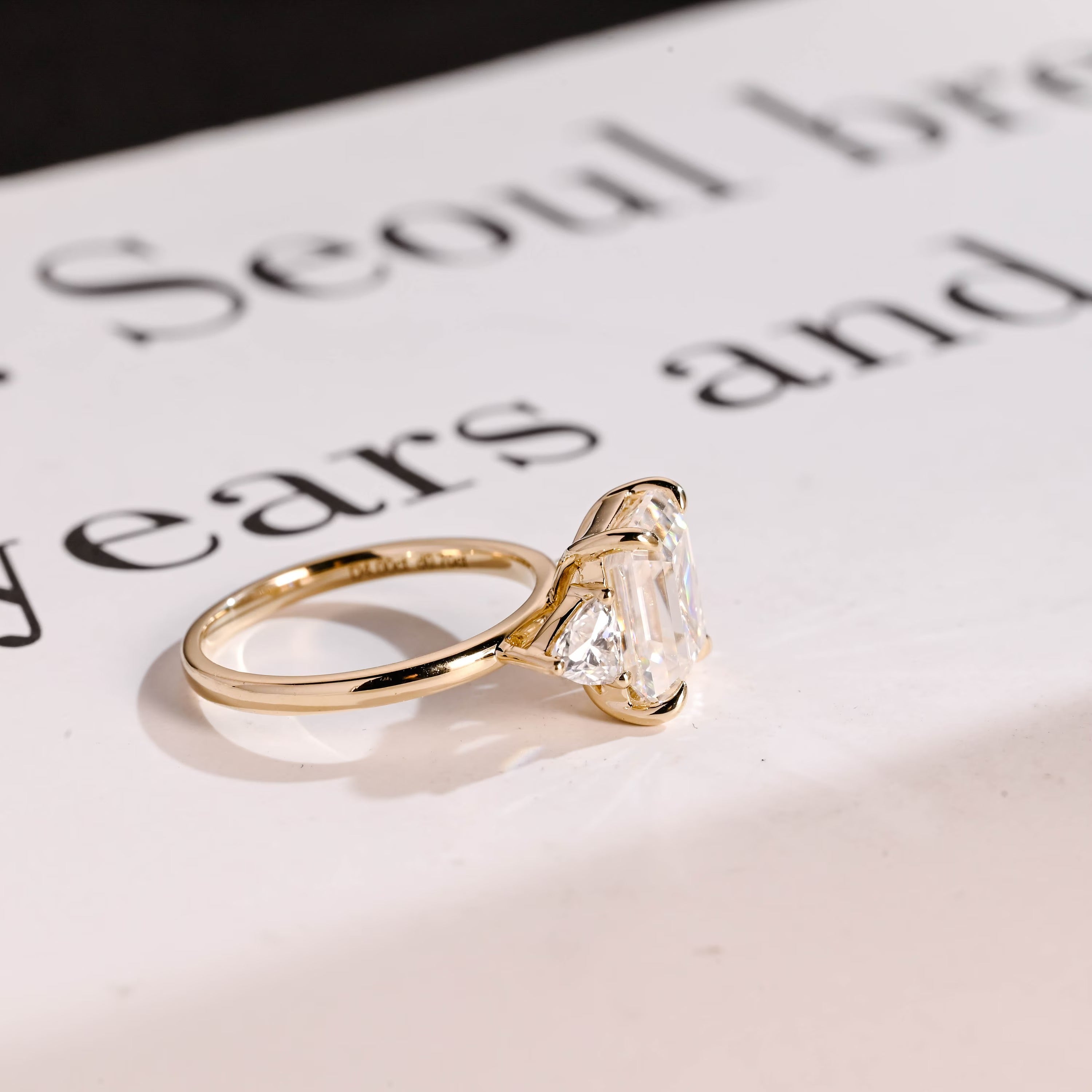 Solid Gold Emerald Cut Moissanite Engagement Ring With Trillion Accent, Three Stone Ring