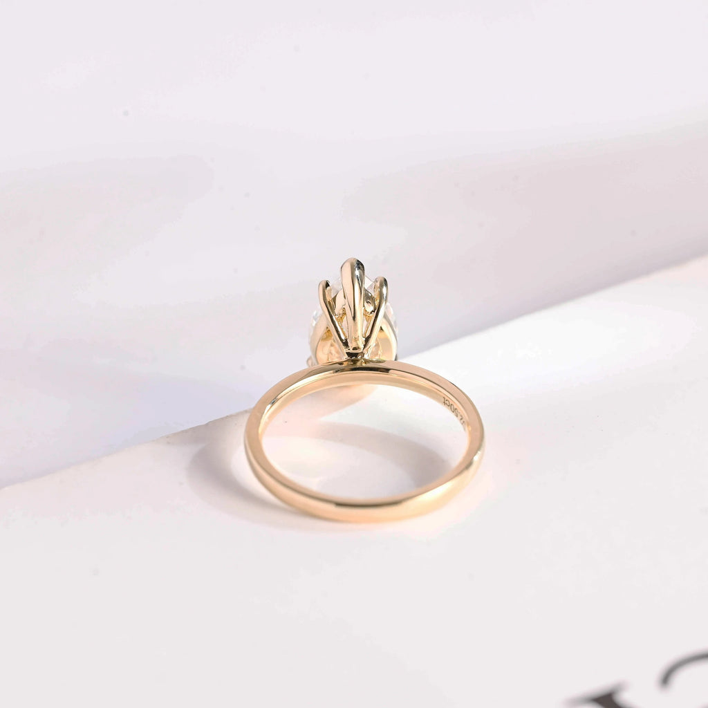 Solid Gold Minimalist Pear Moissanite Engagement Ring