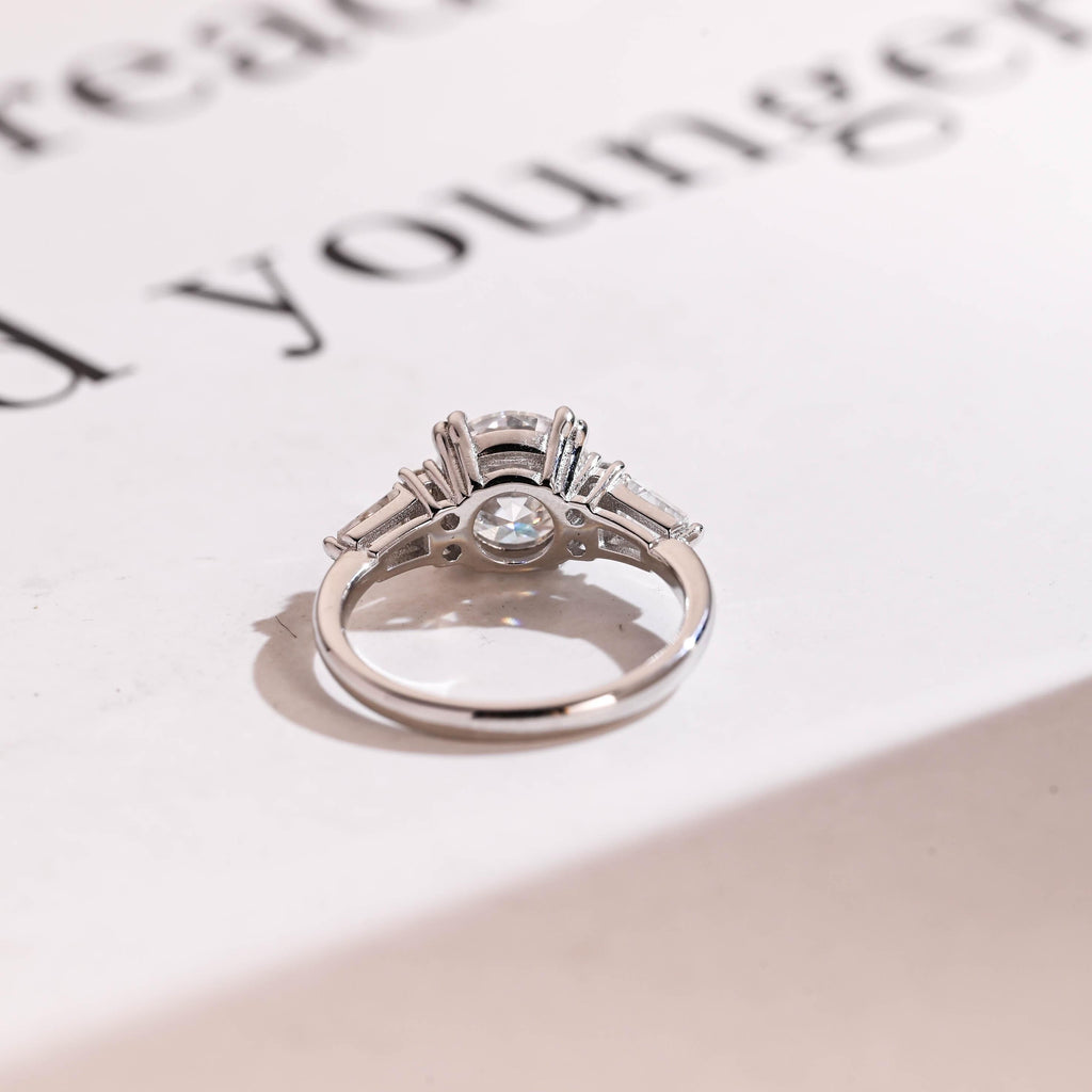 Solid Gold Round Cut Moissanite Engagement Ring with Trapezoid Accent