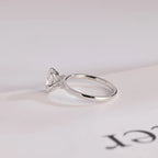Solid Gold Pear Cut Moissanite Engagement Ring with Side Stone