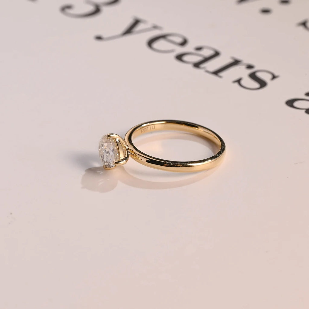 Solid Gold East-West Pear Moissanite Engagement Ring
