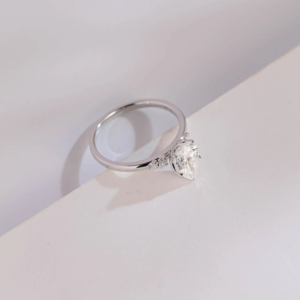 Solid Gold Pear Cut Moissanite Engagement Ring with Side Stone