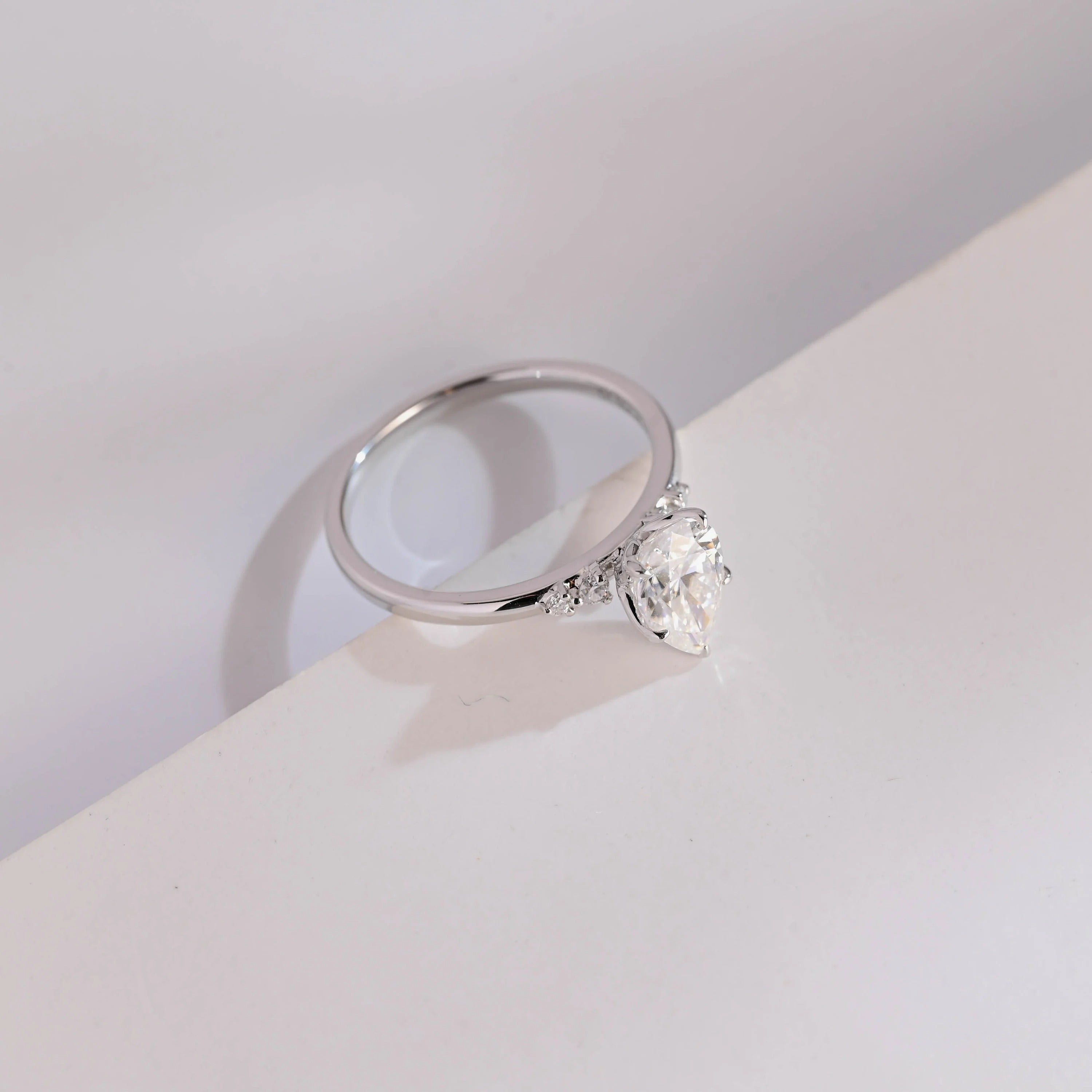Solid Gold Pear Cut Moissanite Engagement Ring with Side Stone
