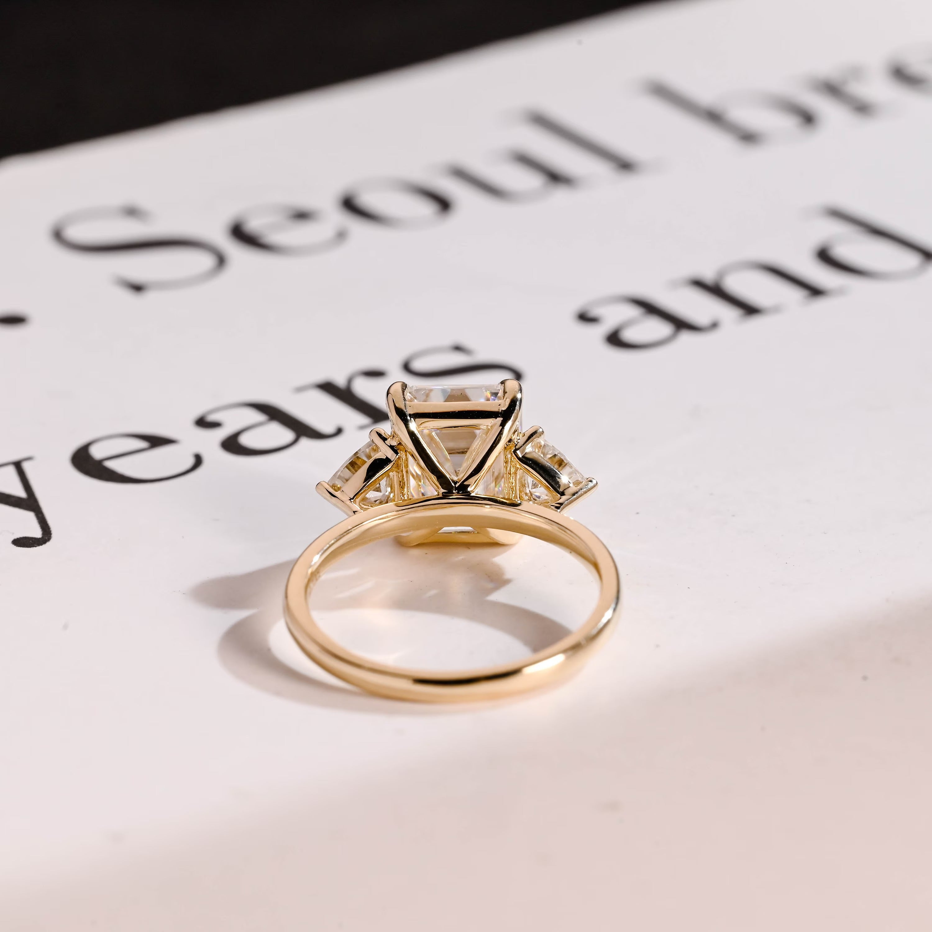 Solid Gold Emerald Cut Moissanite Engagement Ring With Trillion Accent, Three Stone Ring