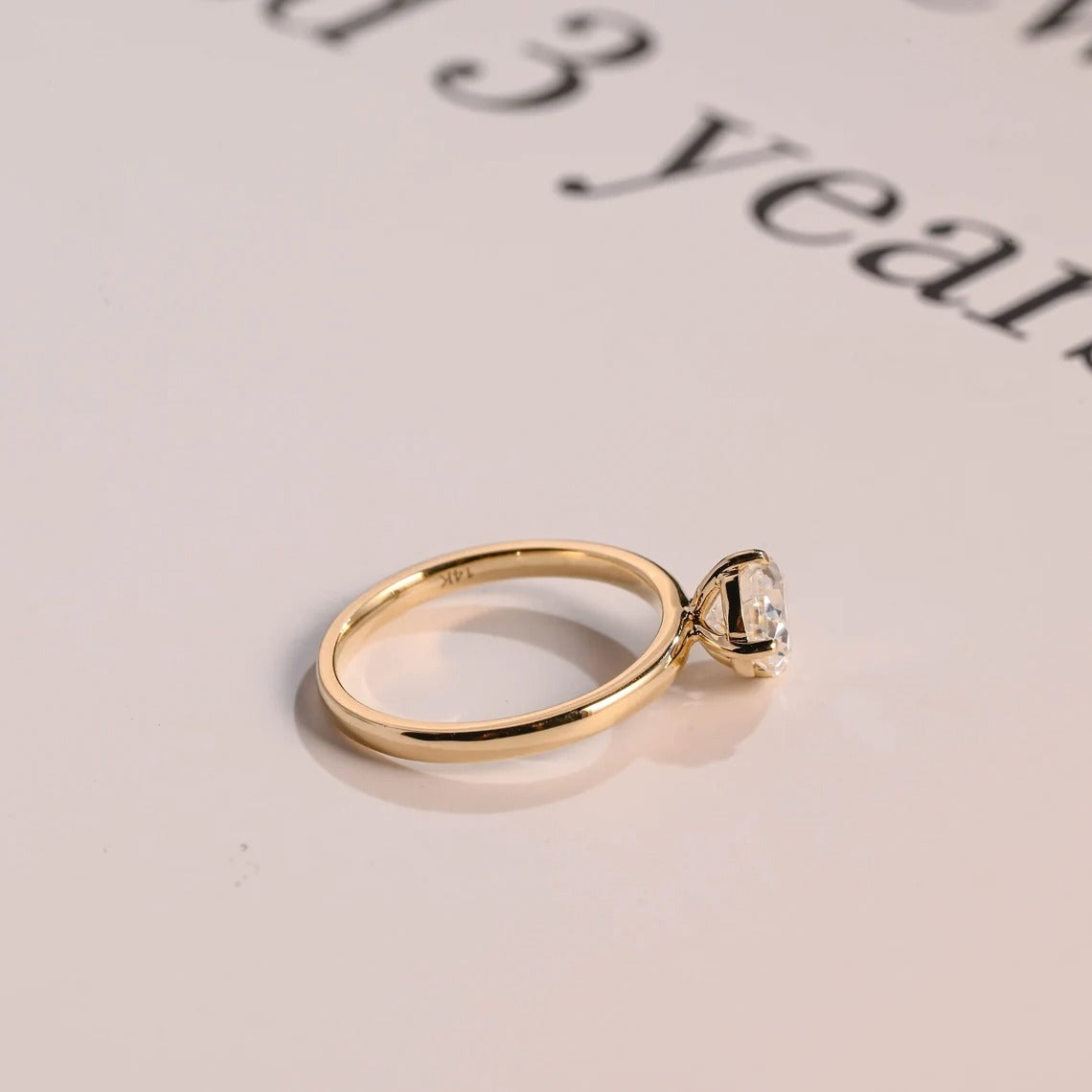 Solid Gold East-West Pear Moissanite Engagement Ring