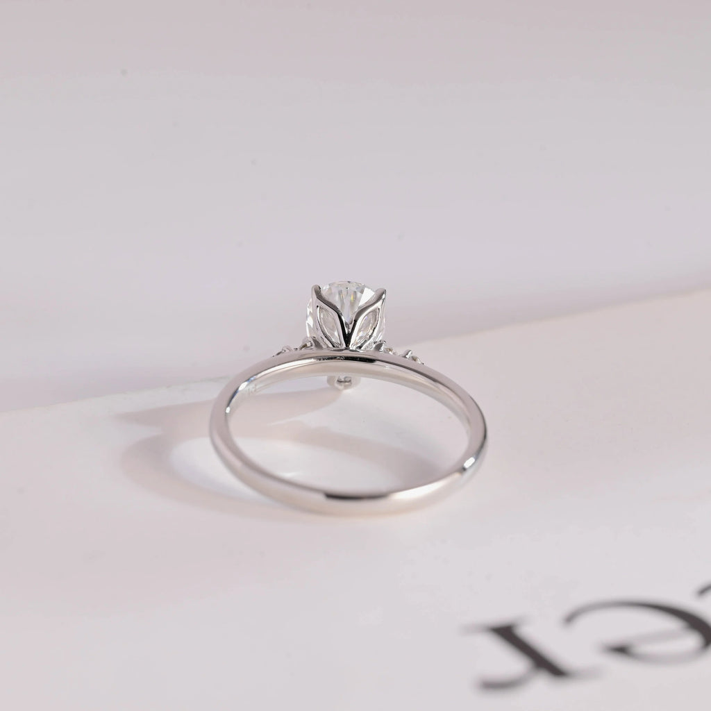 Solid Gold Pear Cut Moissanite Engagement Ring with Side Stone
