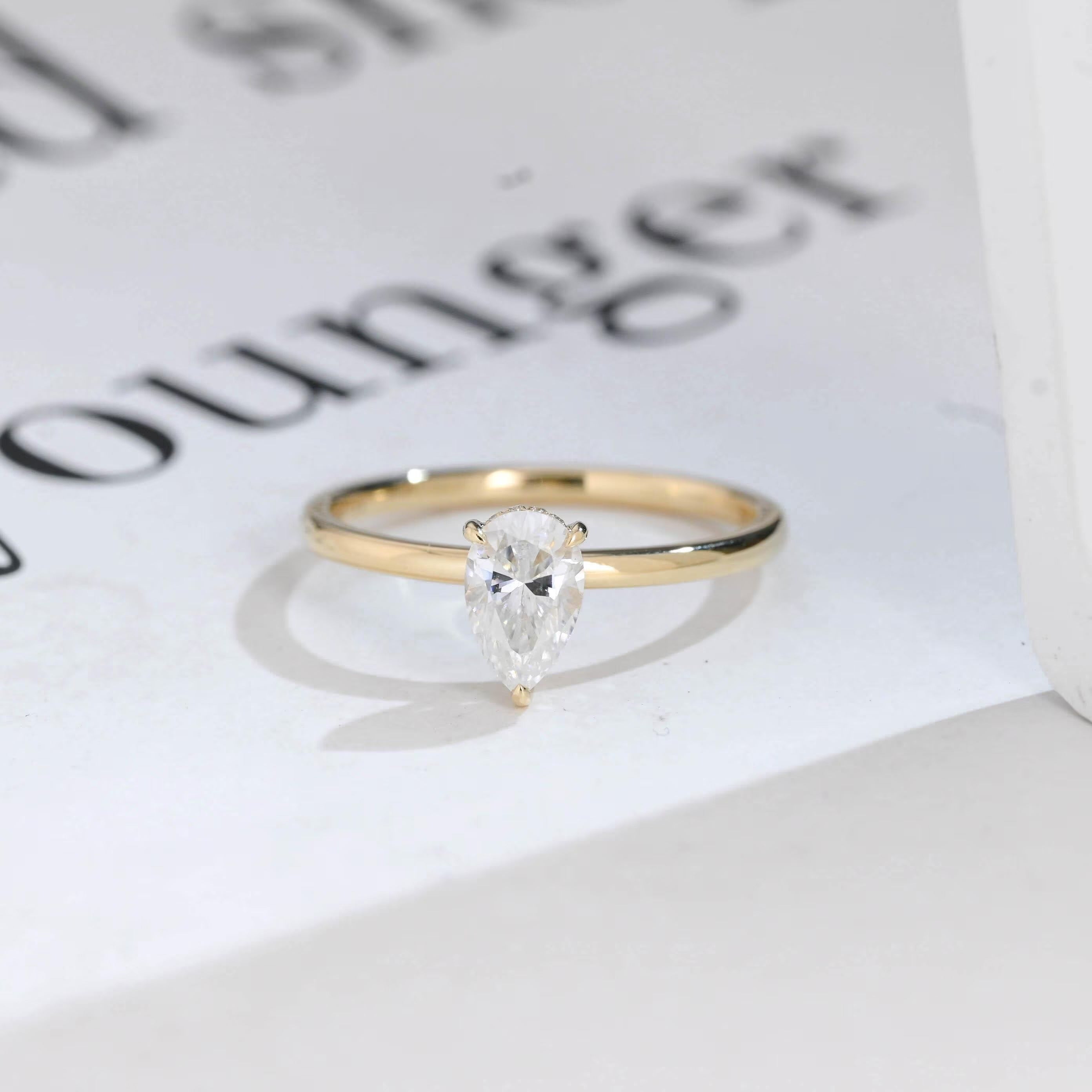 Solid Gold Pear Cut Hidden Halo Moissanite Engagement Ring Main image