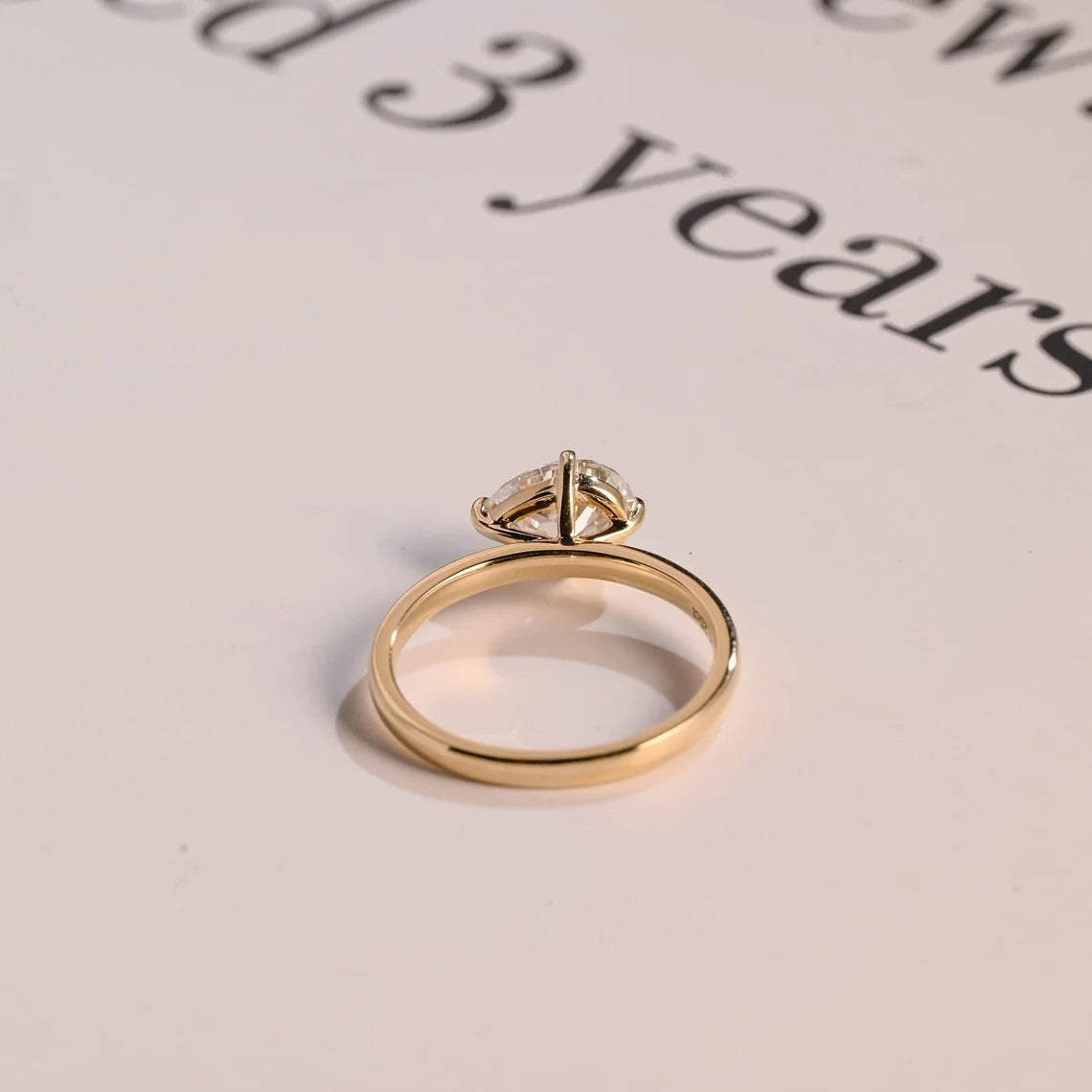 Solid Gold East-West Pear Moissanite Engagement Ring