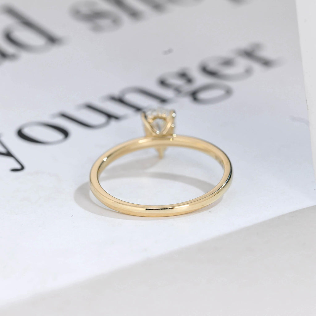 Solid Gold Pear Cut Hidden Halo Moissanite Engagement Ring