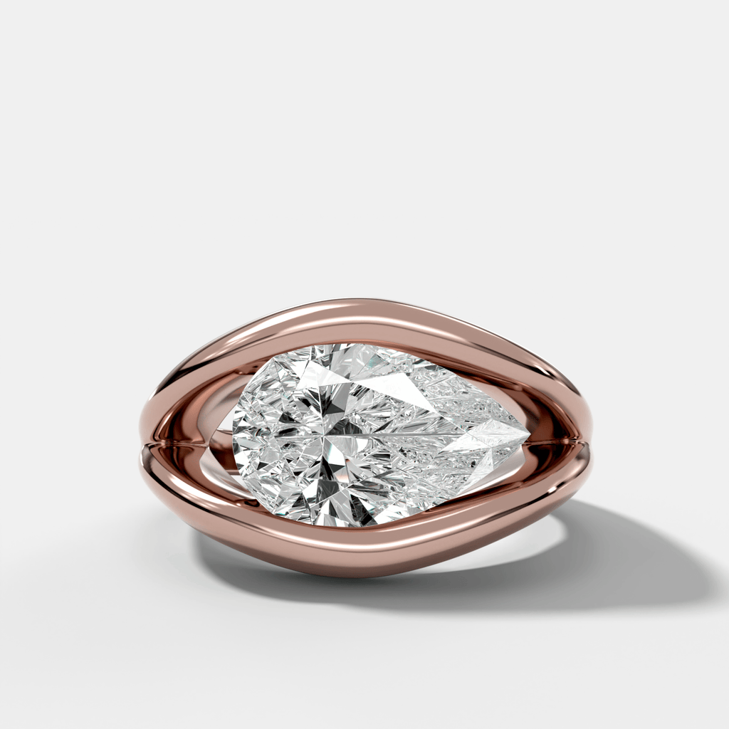 Iris Engagement Ring With a Pear Cut Diamond