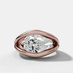 Iris Engagement Ring With a Pear Cut Diamond