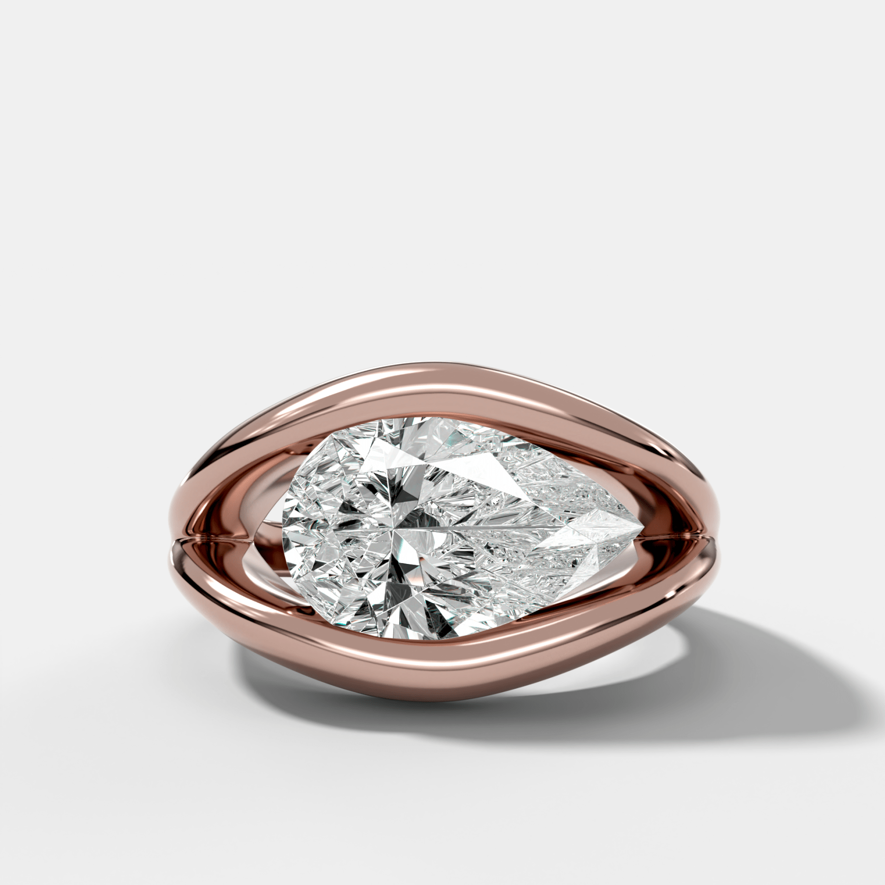 Iris Engagement Ring With a Pear Cut Diamond