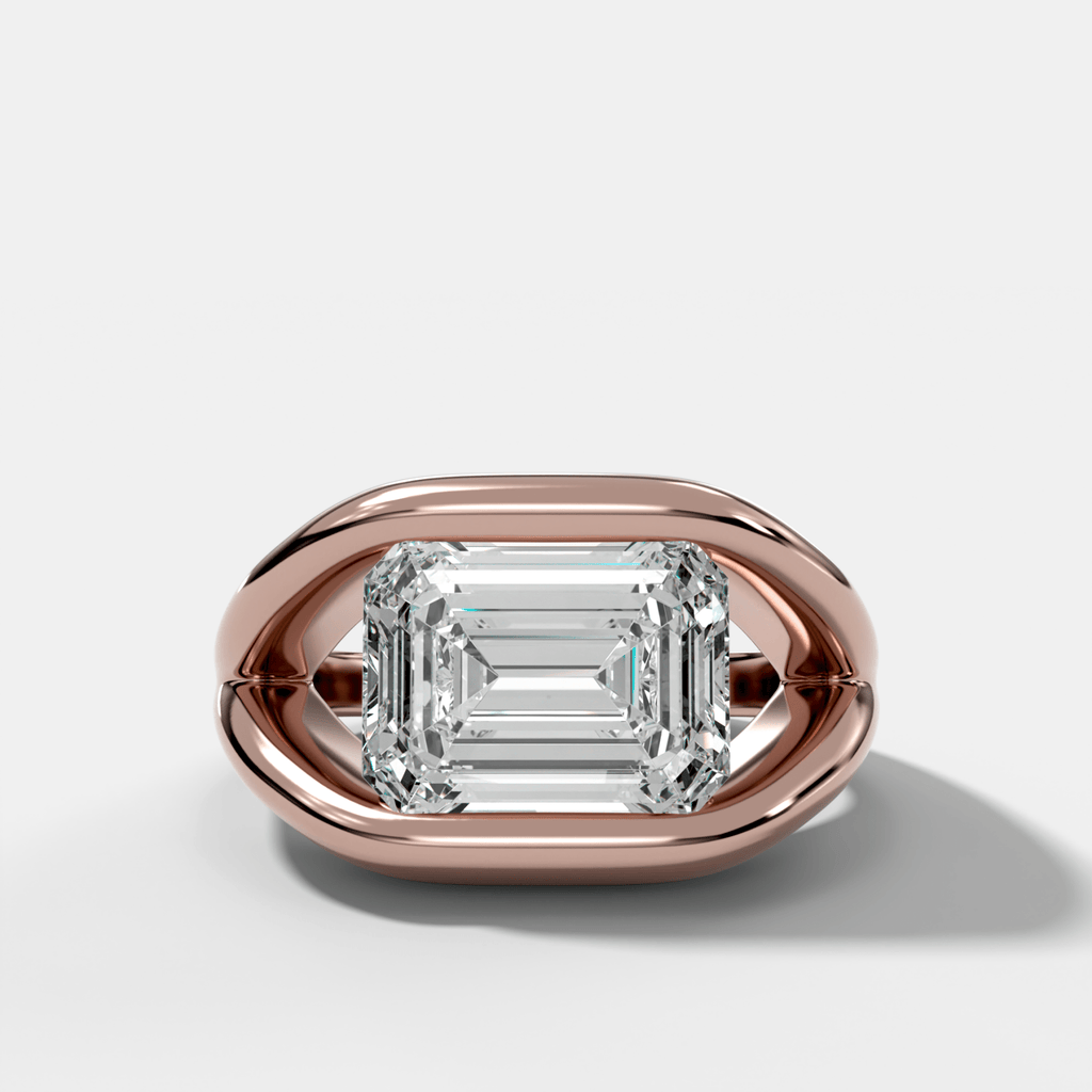Iris Engagement Ring With East West Emerald Cut Diamond
