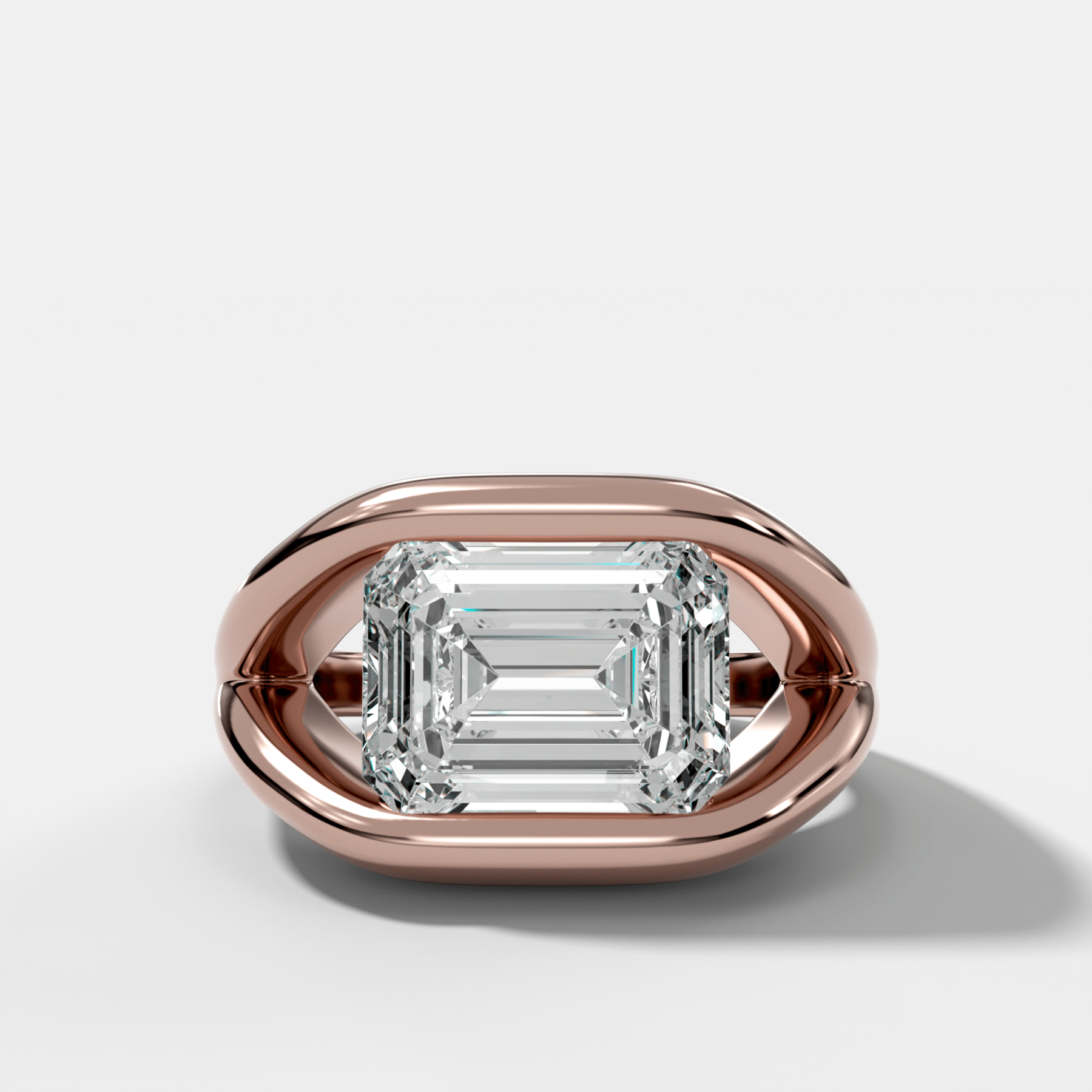 Iris Engagement Ring With East West Emerald Cut Diamond