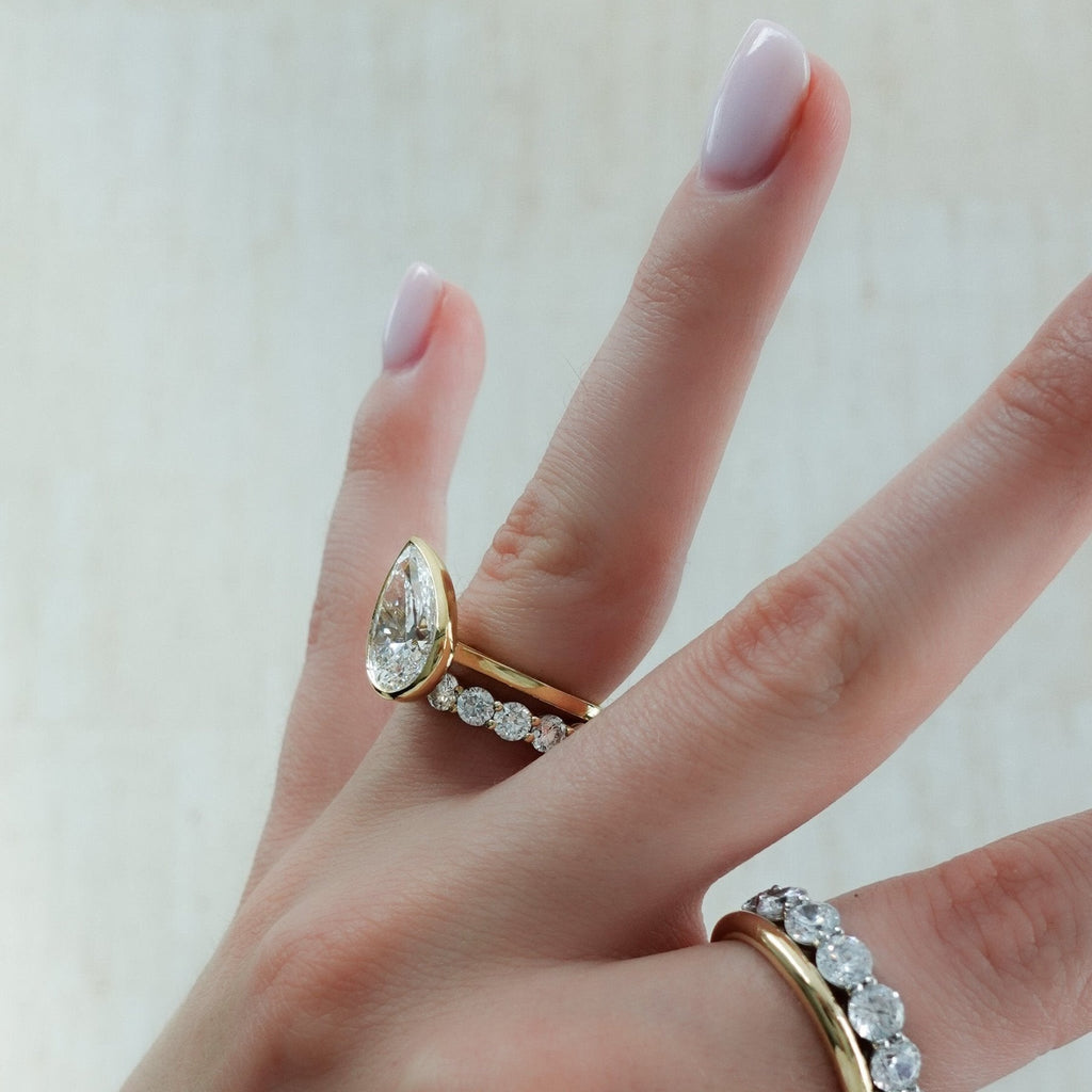 Jumbo Shared Prong Wedding Band With Round Diamonds