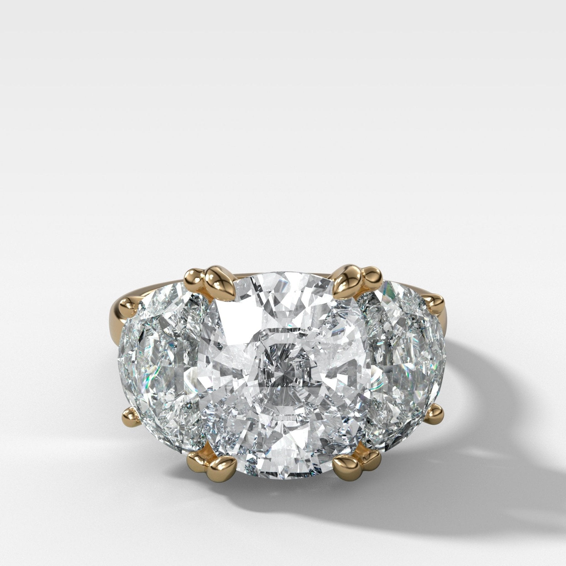 Jumbo Three Stone ring with Half Moon sides & an Elongated Cushion Cut