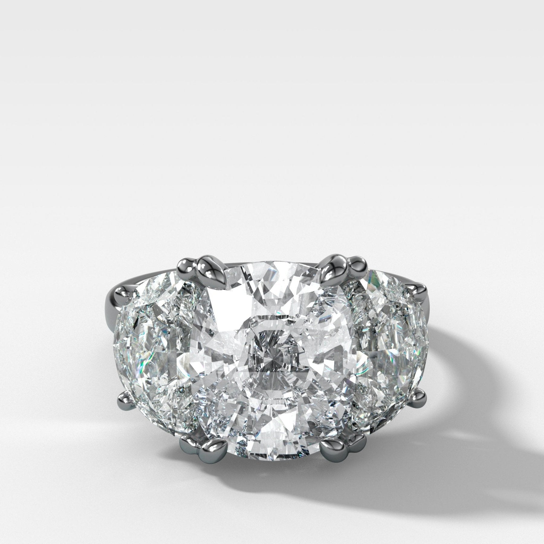 Jumbo Three Stone ring with Half Moon sides & an Elongated Cushion Cut