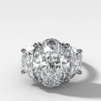 Jumbo Three Stone ring with Half Moon sides & an Oval Cut