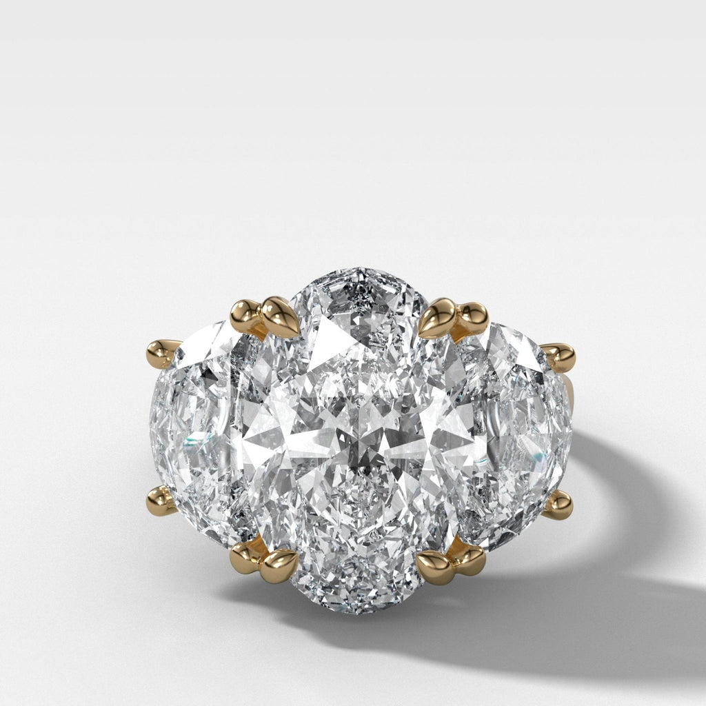 Jumbo Three Stone ring with Half Moon sides & an Oval Cut