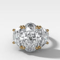 Jumbo Three Stone ring with Half Moon sides & an Oval Cut