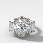 Jumbo Three Stone ring with Half Moon sides & an Oval Cut
