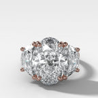 Jumbo Three Stone ring with Half Moon sides & an Oval Cut