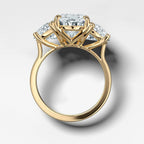 Jumbo Three Stone ring with Half Moon sides & an Oval Cut