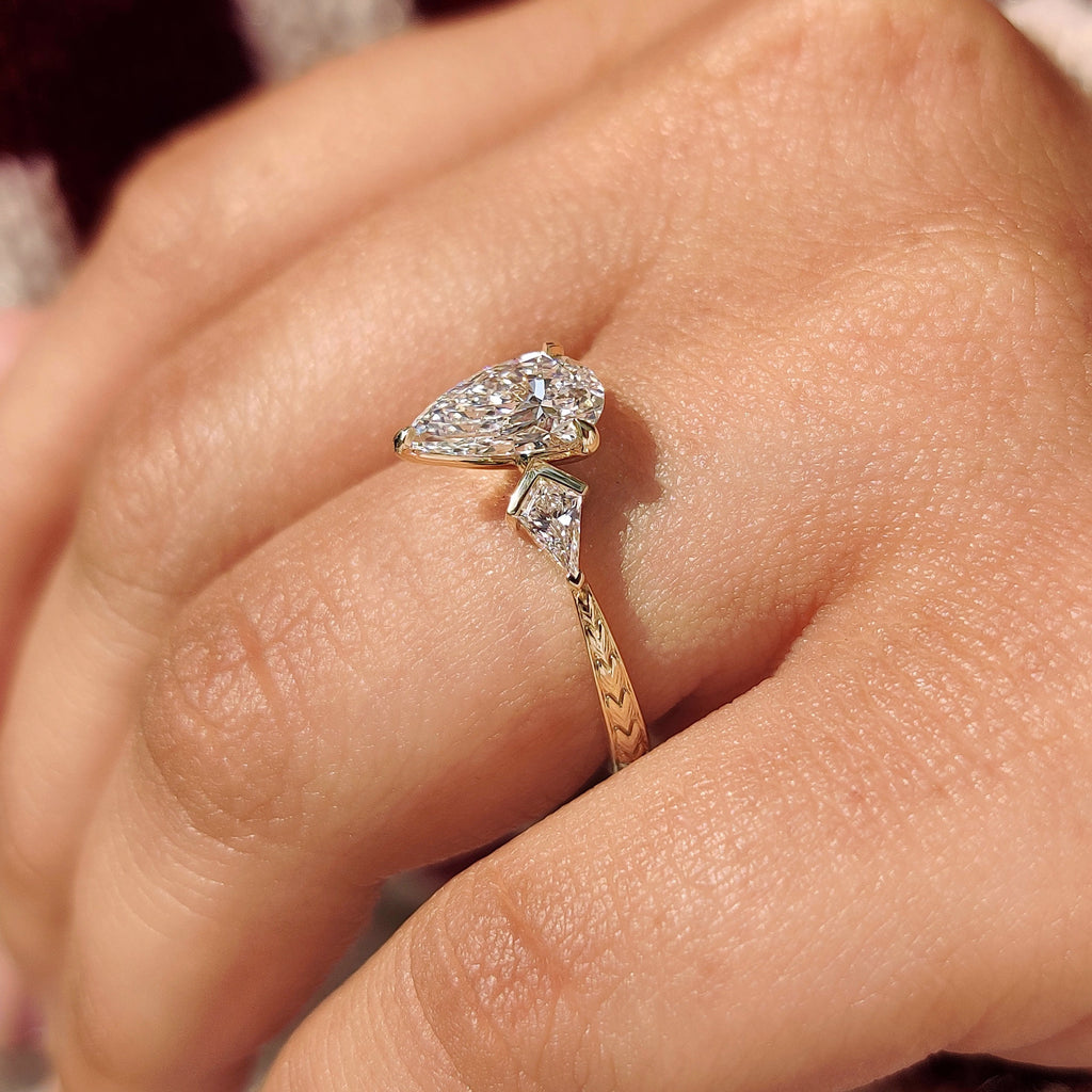 Pear and Kite Cut Three Diamond Ring with Art Deco Band