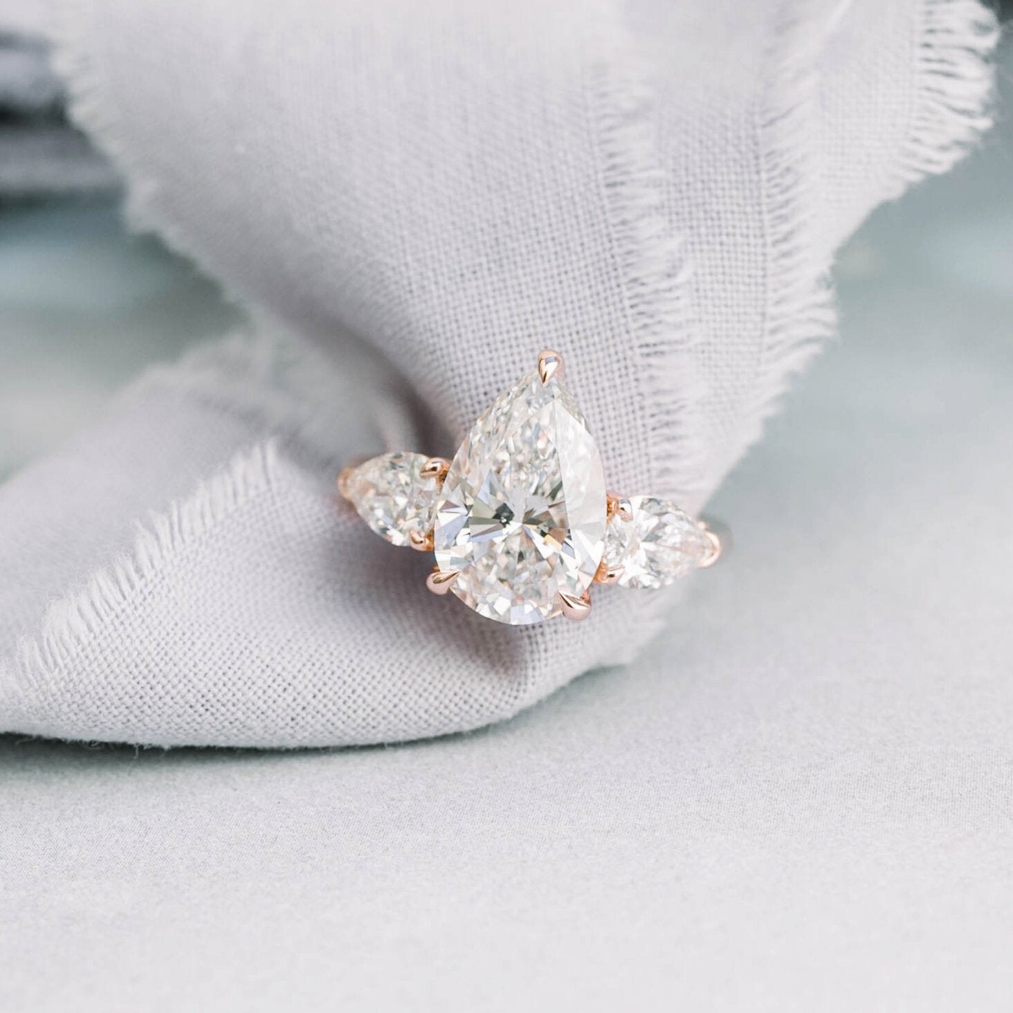 2.0 CT Pear Cut Moissanite Three Stone Engagement Ring