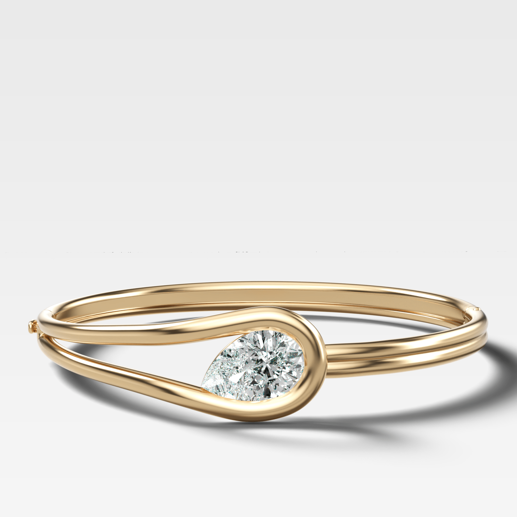 Lasso Bangle with Tilted Pear Cut Diamond