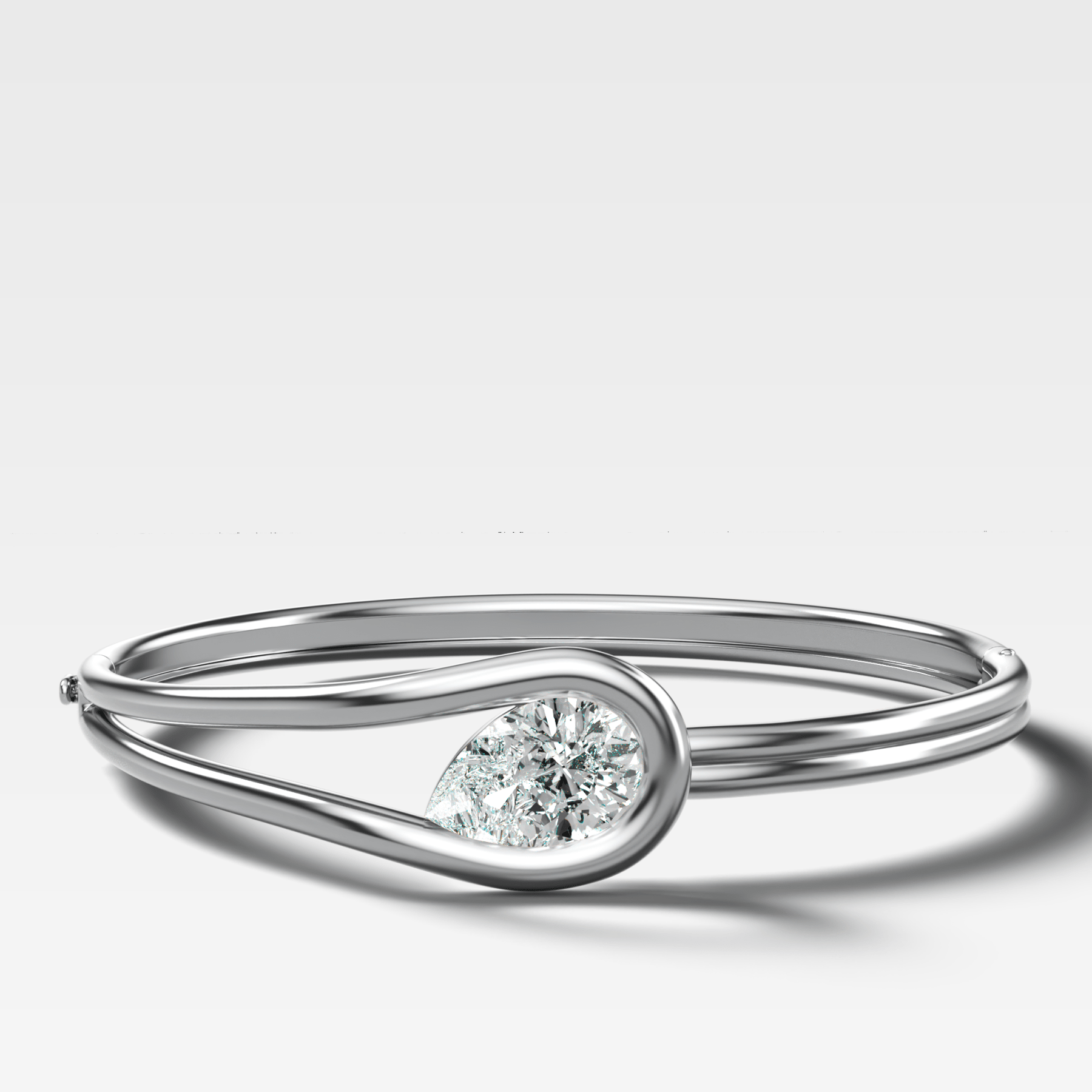 Lasso Bangle with Tilted Pear Cut Diamond