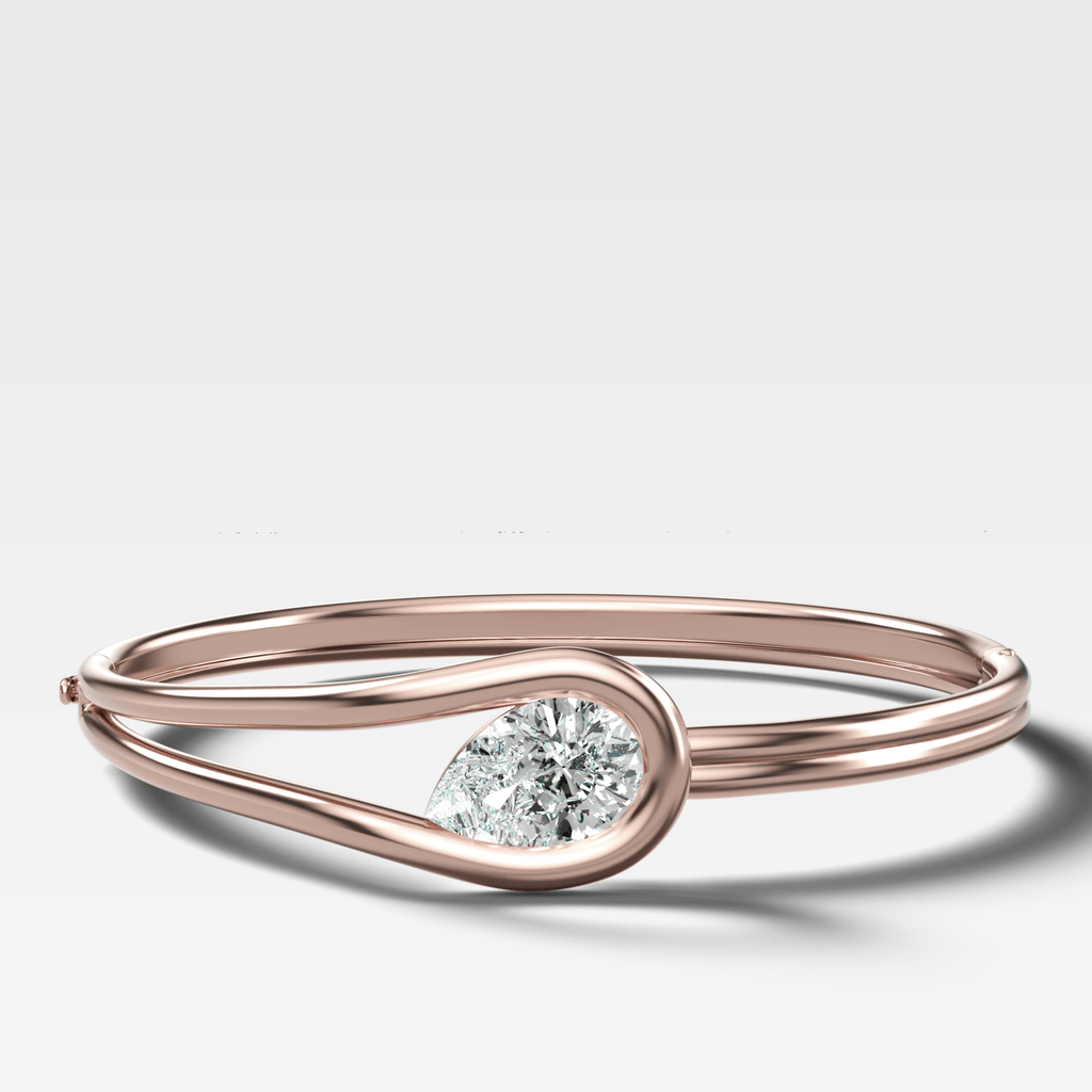 Lasso Bangle with Tilted Pear Cut Diamond