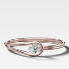 Lasso Bangle with Tilted Pear Cut Diamond