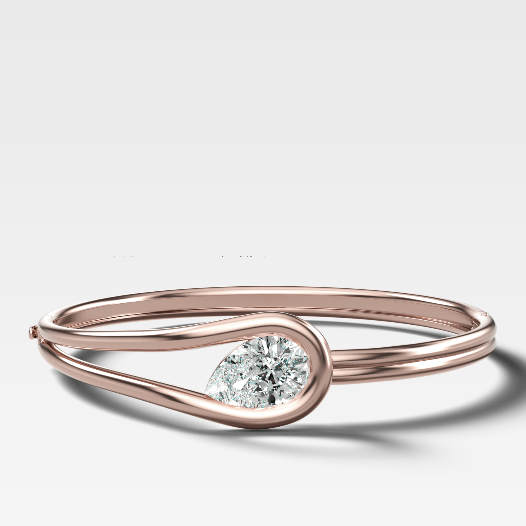 Lasso Bangle with Tilted Pear Cut Diamond