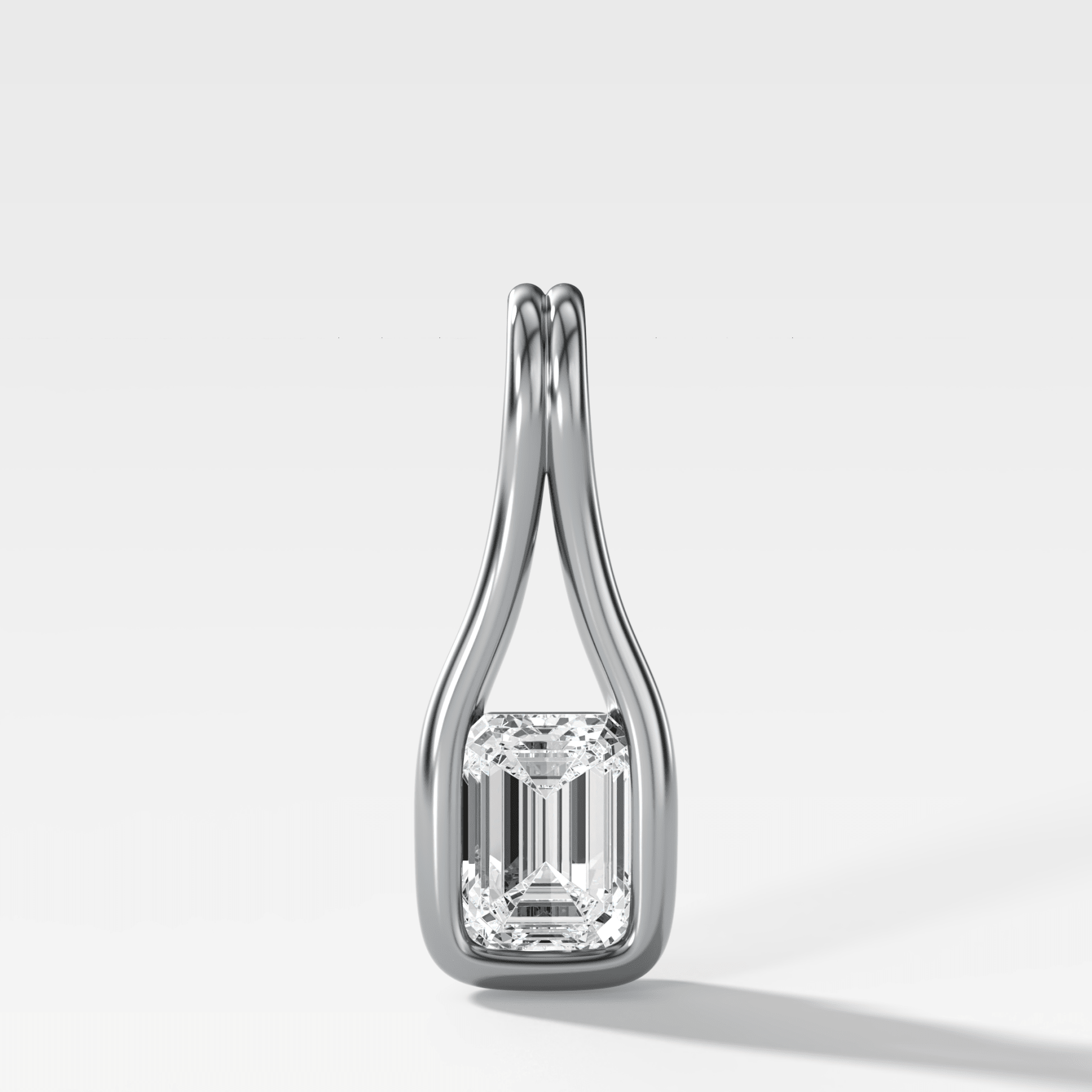 Lasso Emerald Diamond Pendant