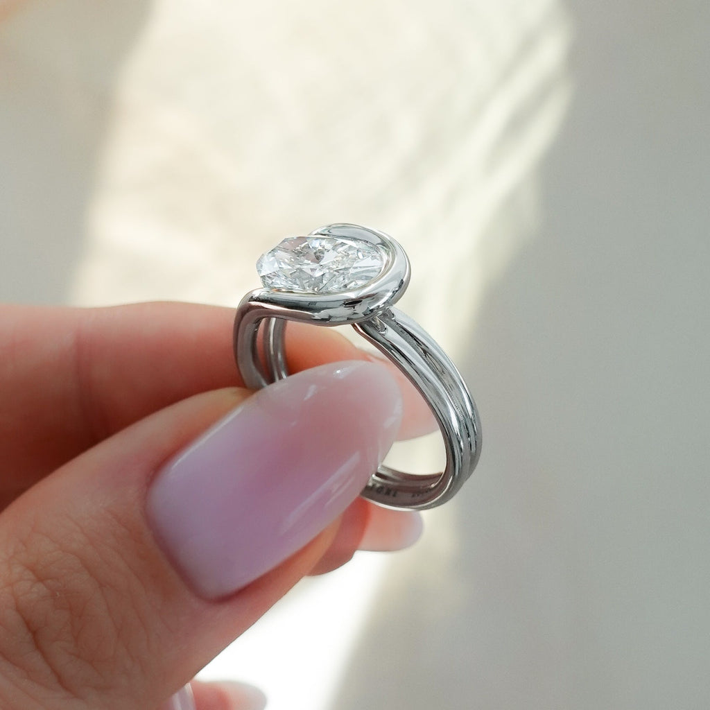 Lasso Engagement Ring with Oval Cut Diamond