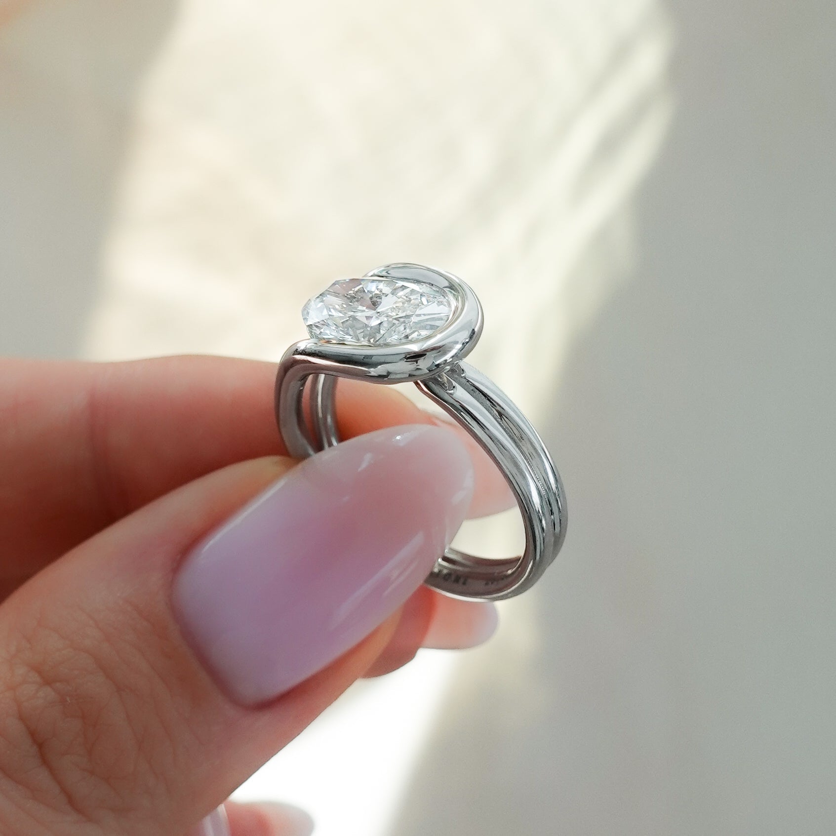 Lasso Engagement Ring with Oval Cut Diamond