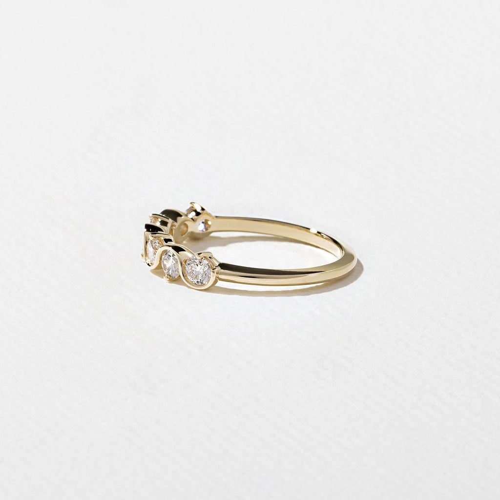 0.60 TCW Round Moissnaite Wave Wedding Band