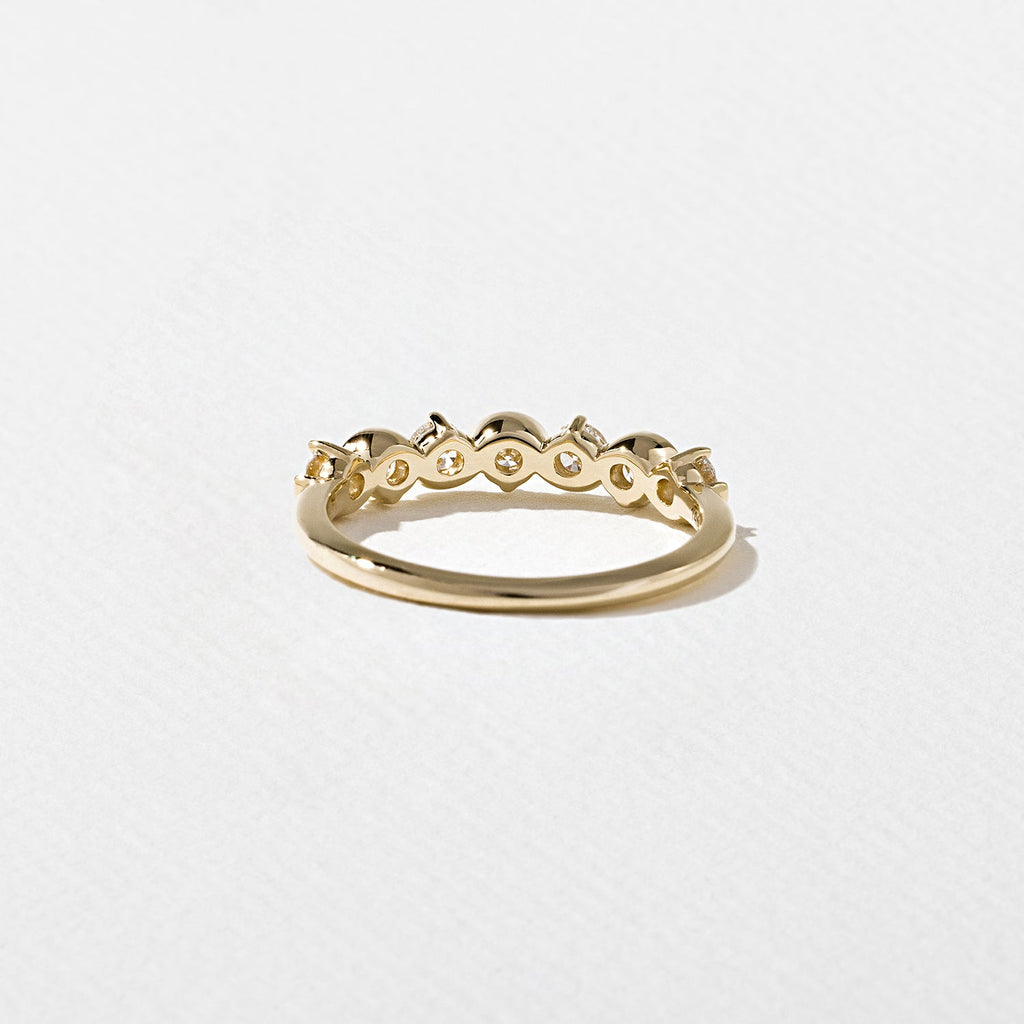 0.60 TCW Round Moissnaite Wave Wedding Band