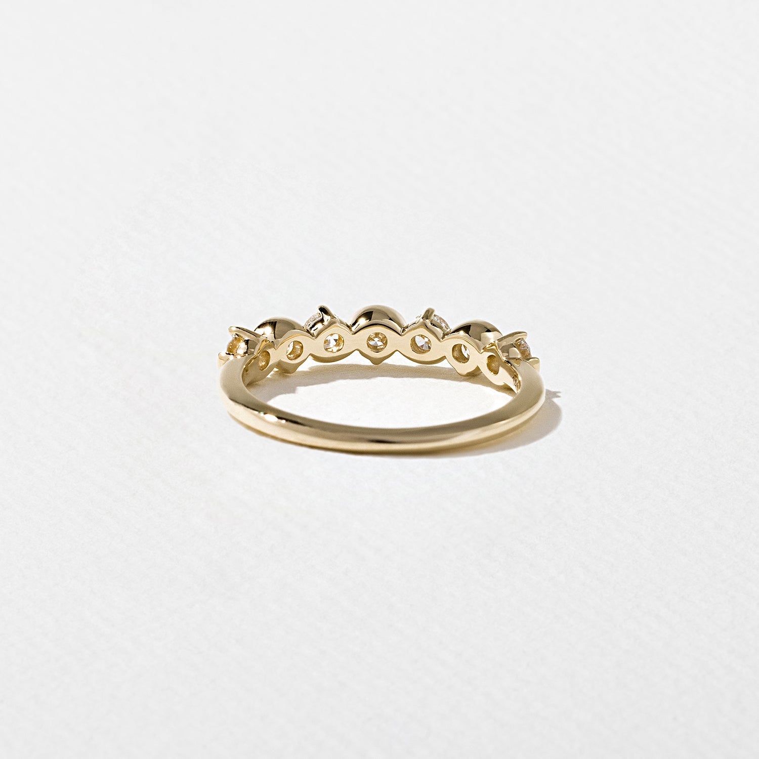 0.60 TCW Round Moissnaite Wave Wedding Band