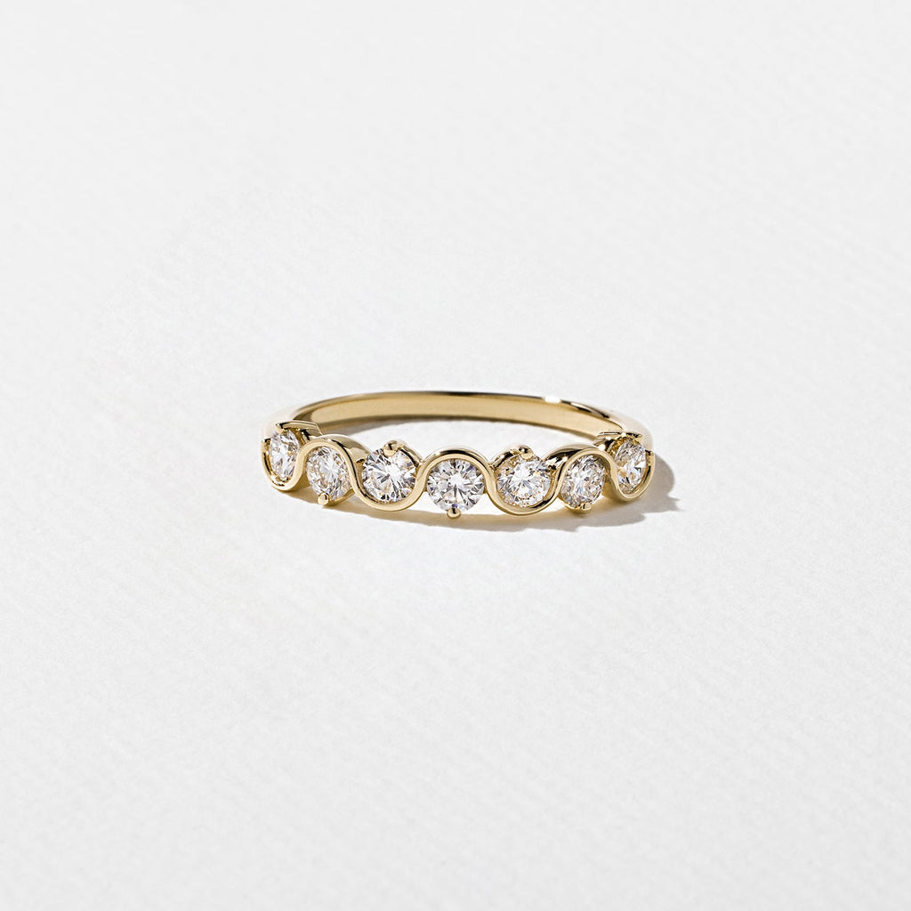 0.60 TCW Round Moissnaite Wave Wedding Band