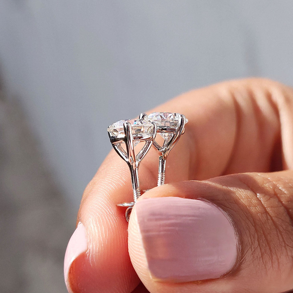 Round Cut Moissanite Earrings In Stud Style
