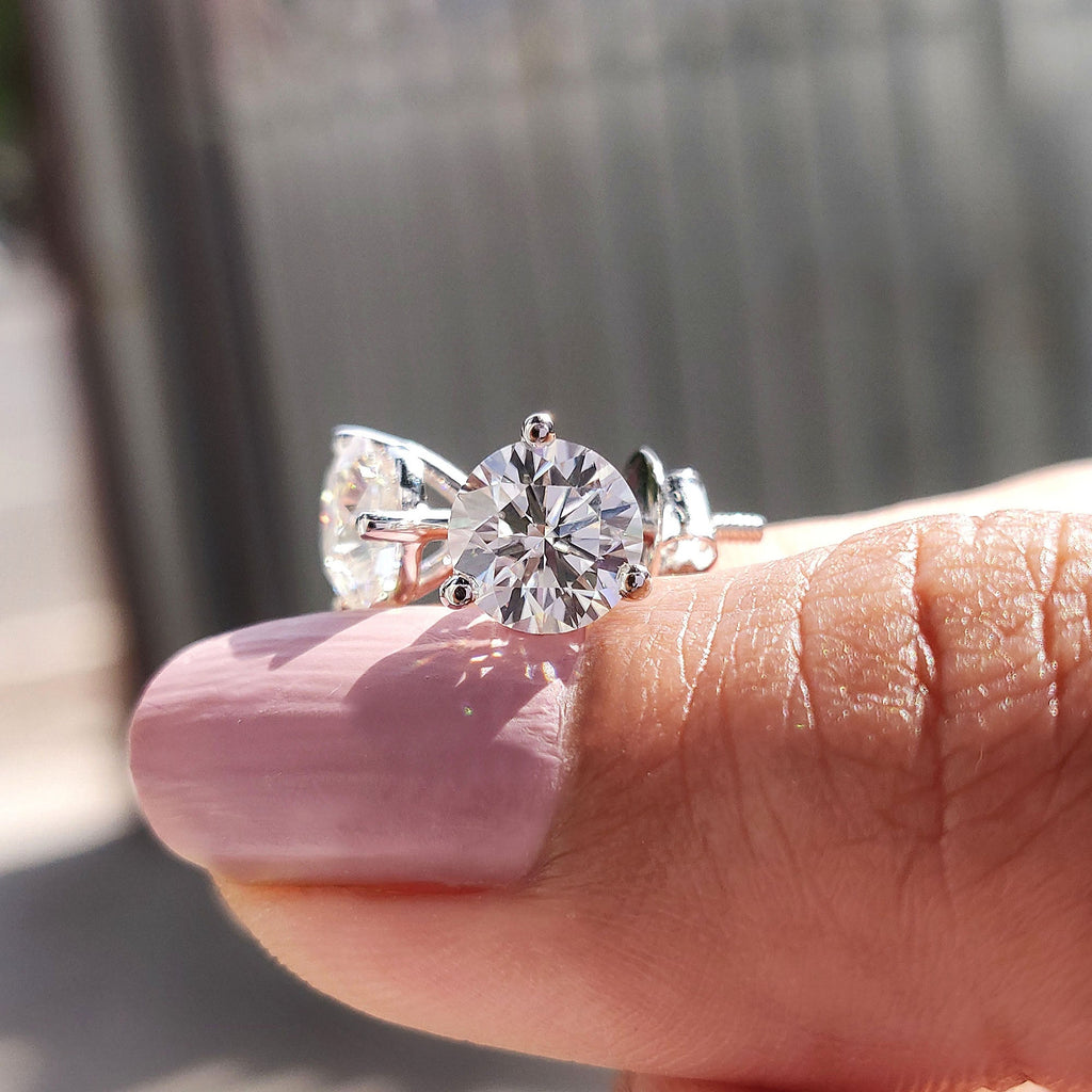 Round Cut Moissanite Earrings In Stud Style